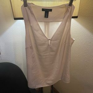 White House black market silk sleeveless with small metal at cleavage!